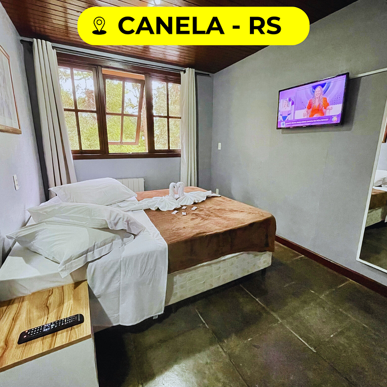 Suíte casal Apto 304 em Canela | Pousada Bella Serra