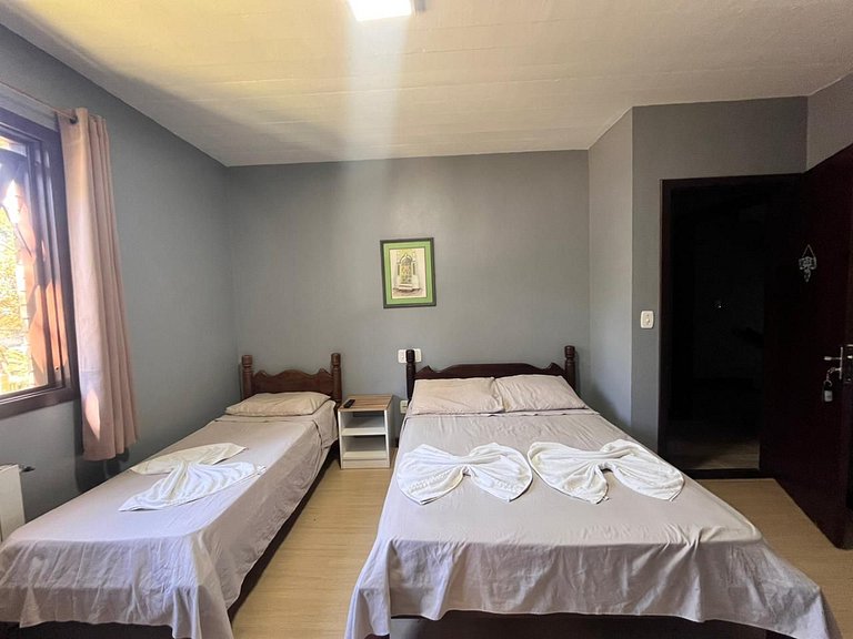 Suíte casal Apto 304 em Canela | Pousada Bella Serra
